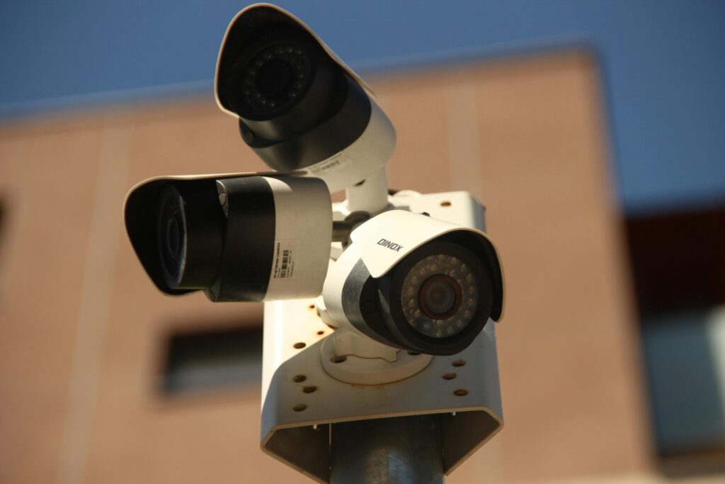 High-resolution surveillance cameras installed in a city environment for security purposes.